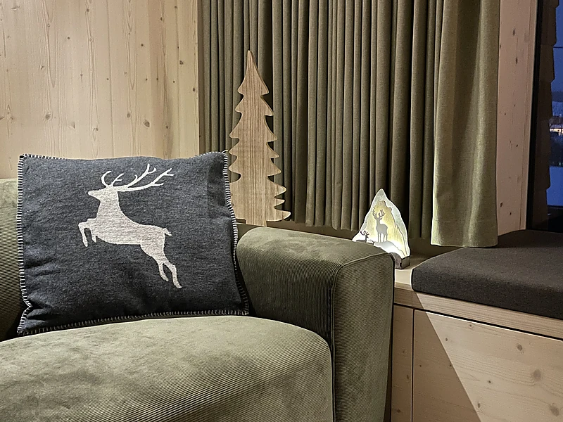 Deer cushion on the sofa