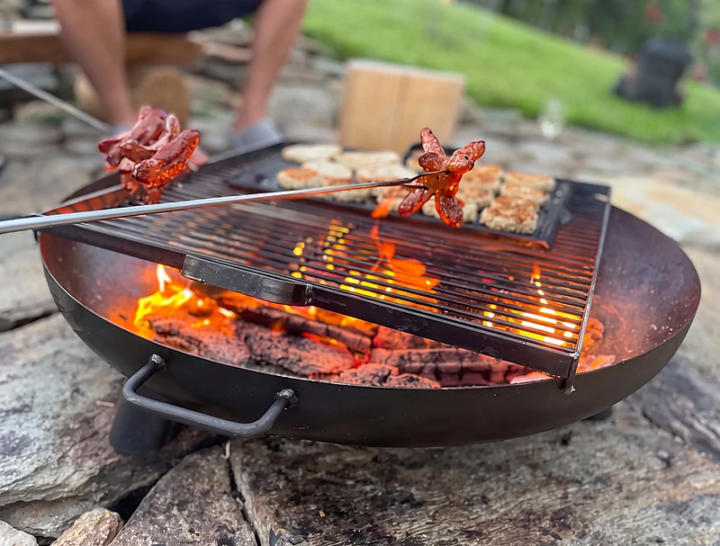 Grilling over the fire pit