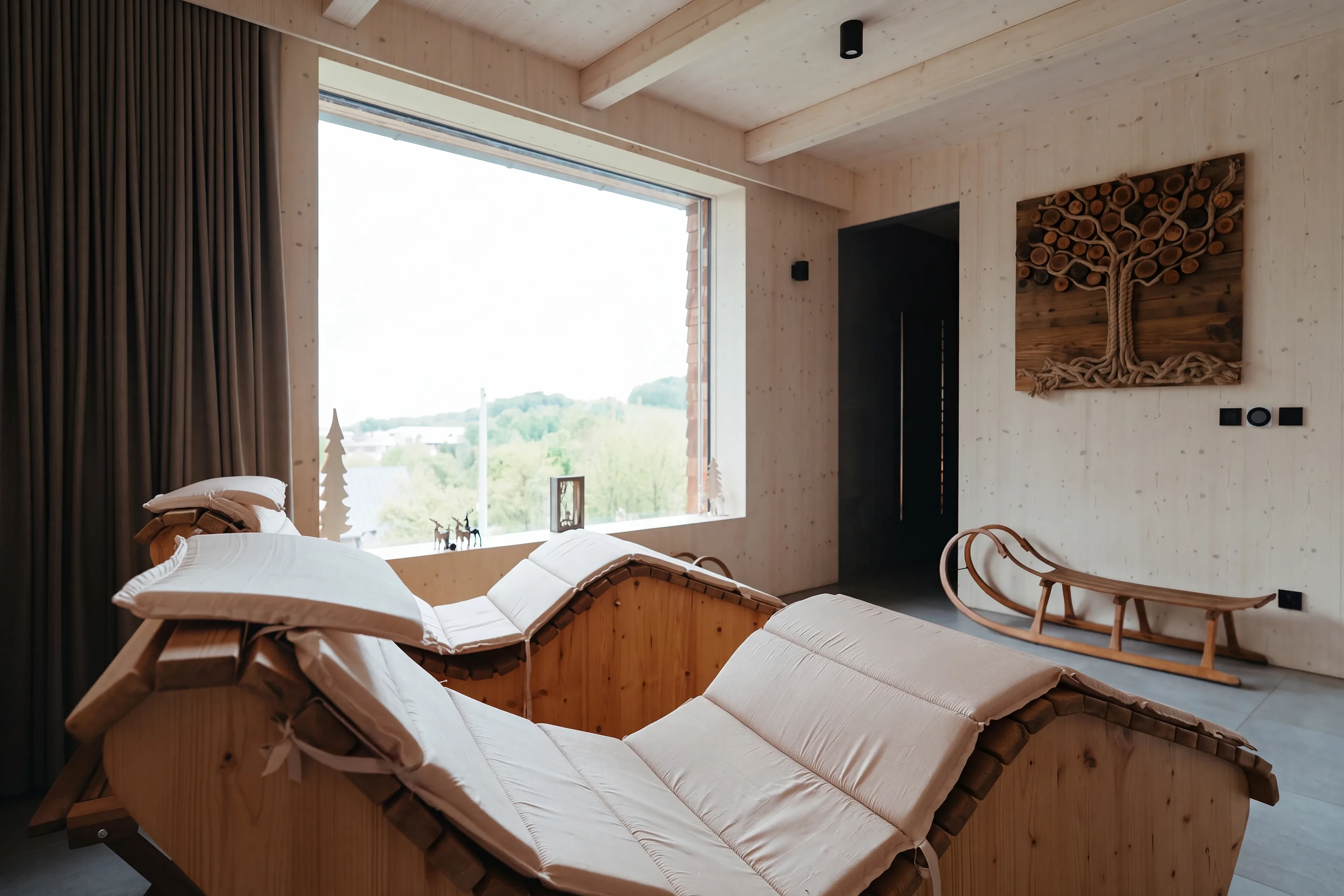 Wooden loungers in the relaxation room