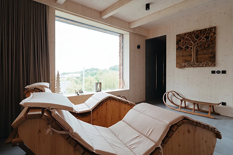 Wooden loungers in the relaxation room