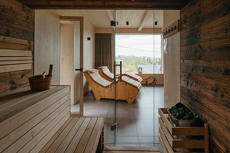 Sauna with a glass wall to the relaxation room