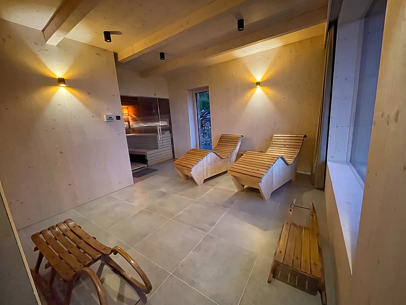 Relaxation room by the sauna with loungers
