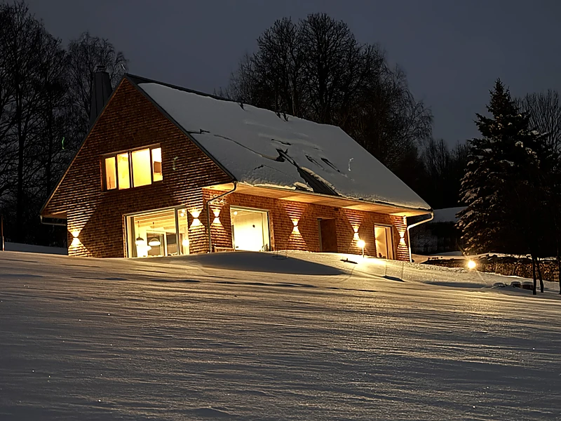 The snowed-in chalet at night